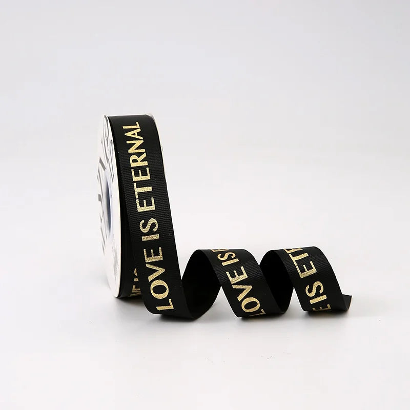 LohSister 2.5cm x 35yard Bronzing Love Is Eternal Wording Fabric Ribbon